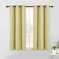 NICETOWN Blackout Curtains & Drapes for Bedroom, Paler Yellow, W34 x L40, Set of 2, Triple Weave Grommet Top Thermal Insulated Light Blocking Panels for Bathroom/Living Room