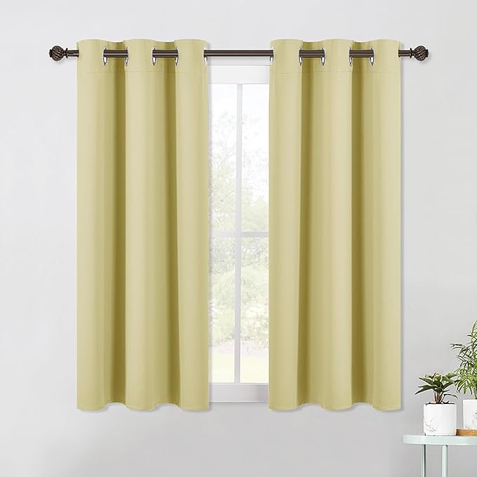 NICETOWN Blackout Curtains & Drapes for Bedroom, Paler Yellow, W34 x L40, Set of 2, Triple Weave Grommet Top Thermal Insulated Light Blocking Panels for Bathroom/Living Room